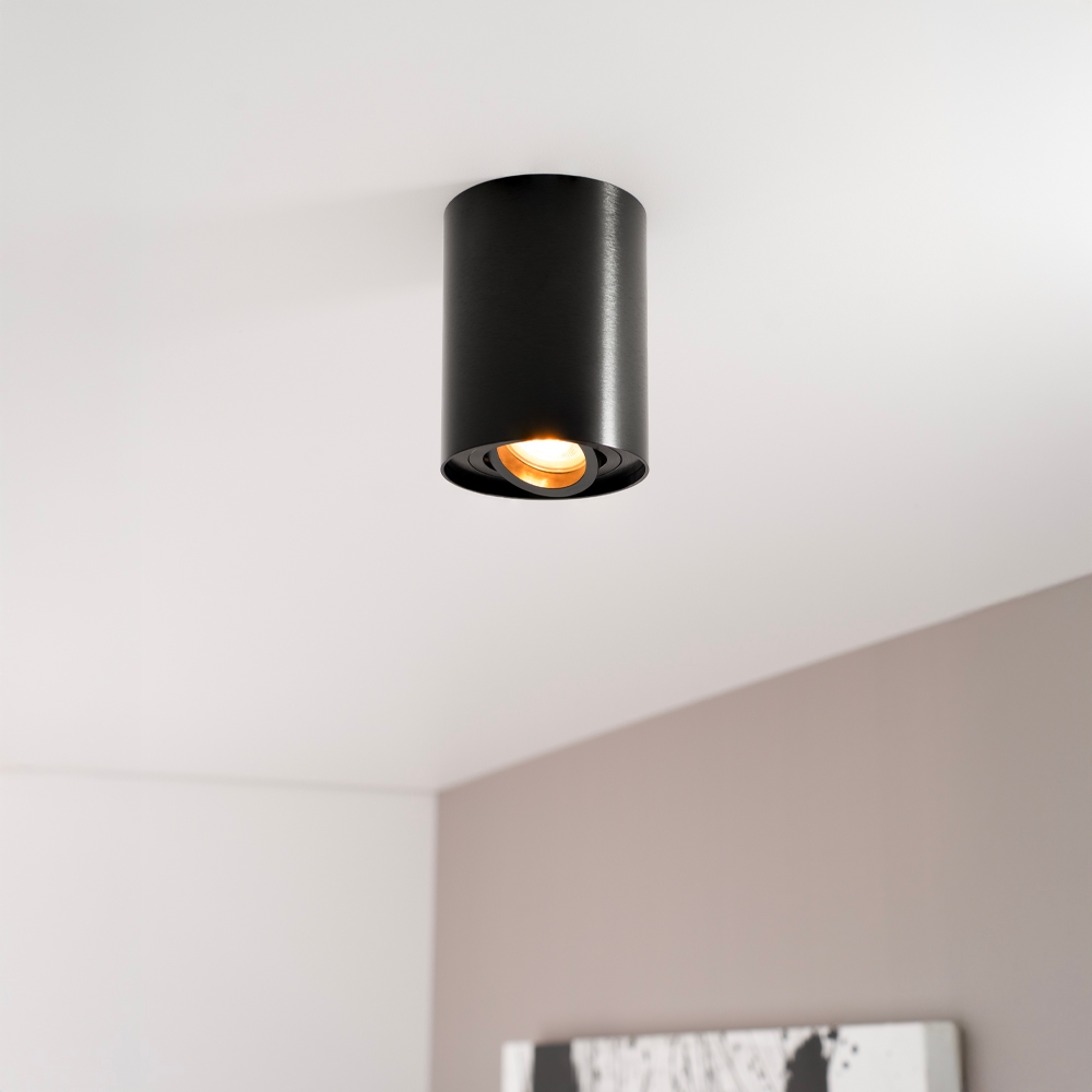 Solis nero - Cilindervormige opbouwspot met enkel lichtaccent en een geborstelde zwarte coating